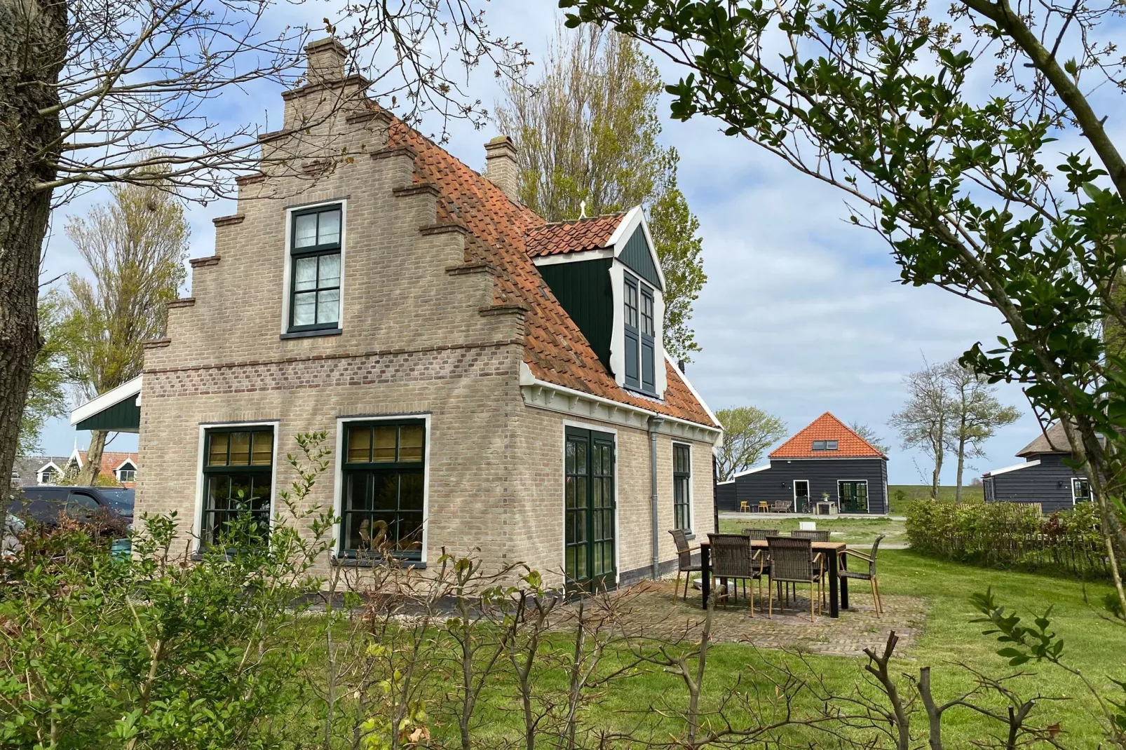 Recreatiepark Wiringherlant - Wiringher Villa 17-Buitenkant zomer