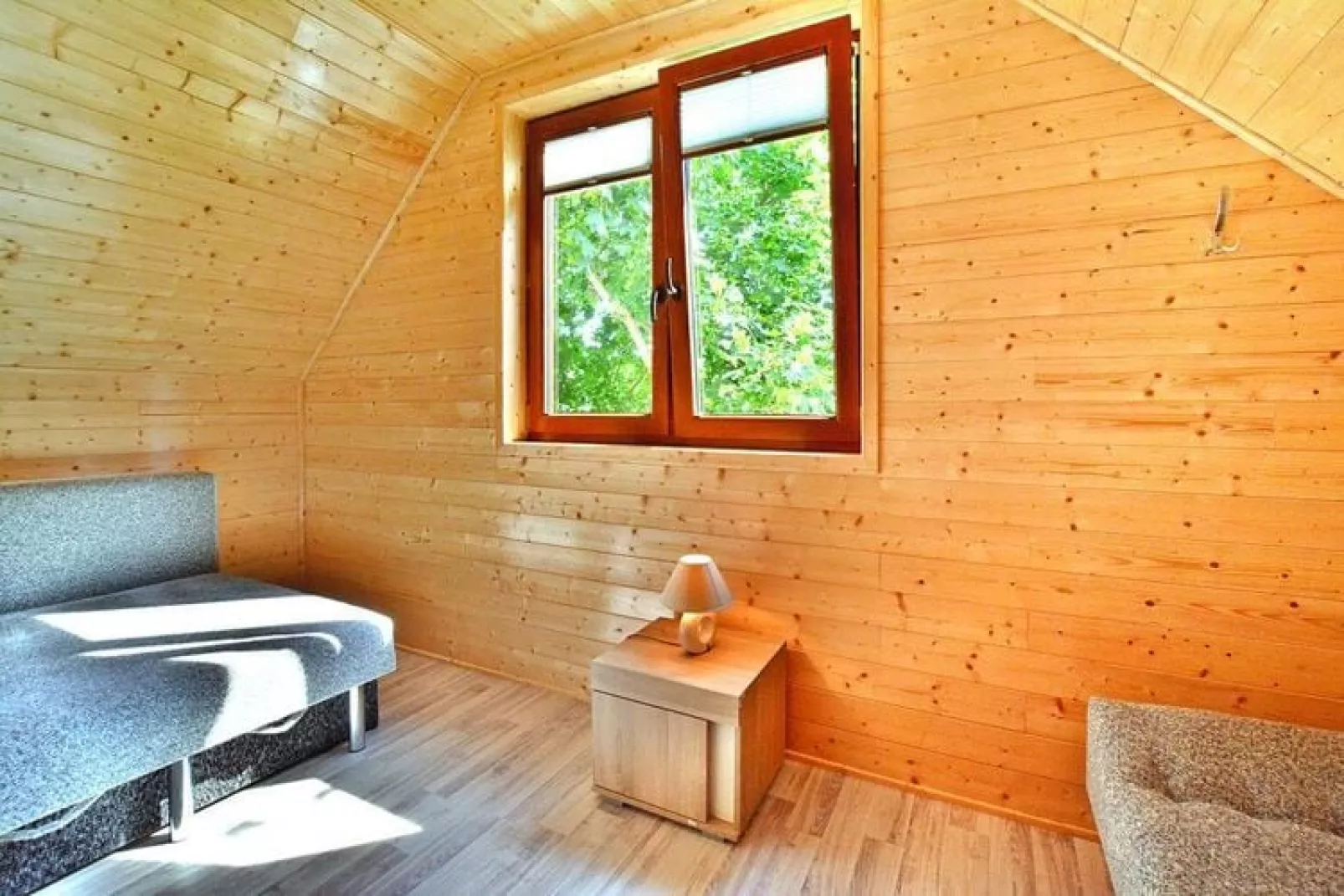 Domek piętrowy dla 2 osób Mielno-Woonkamer