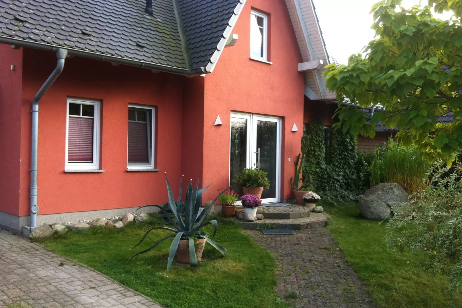 An der Wismarbucht mit Kamin-Buitenkant zomer