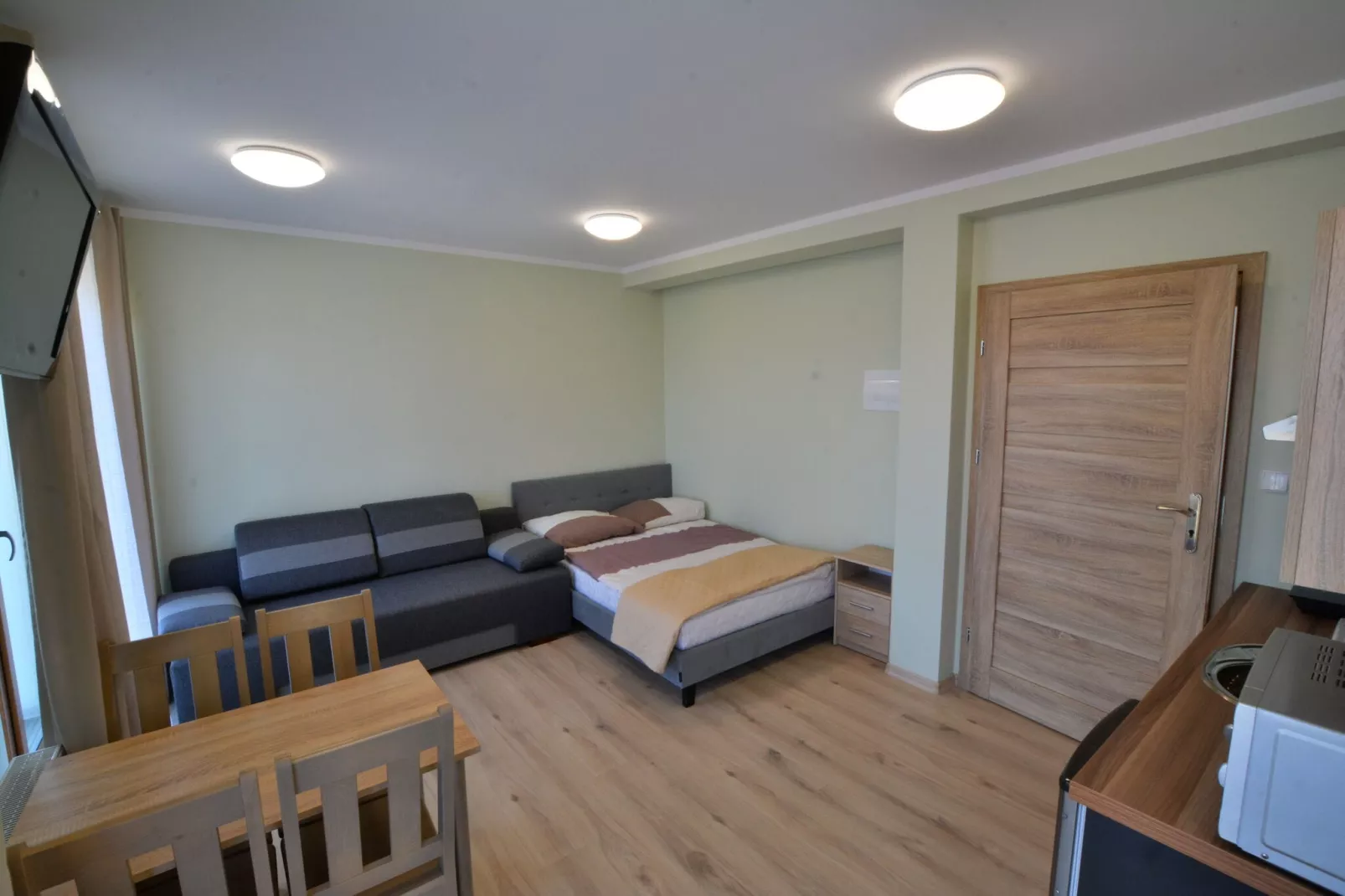 Pokój 3-osobowy na poddaszu Sarbinowo-Woonkamer