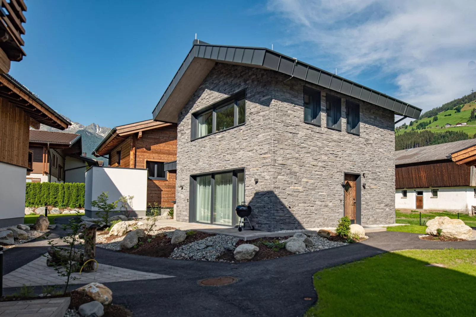 Feriendorf Das Dorf - Steinhaus-Buitenkant zomer