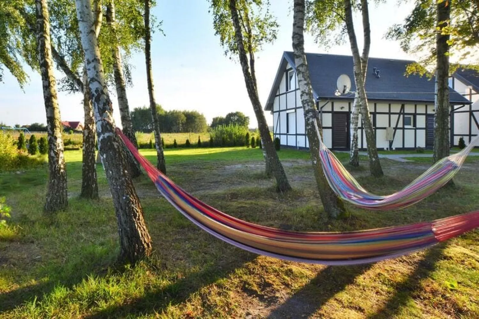 Piętrowy dom wakacyjny z tarasem 40 m2 dla 4 osób Jarosławiec-Buitenkant zomer