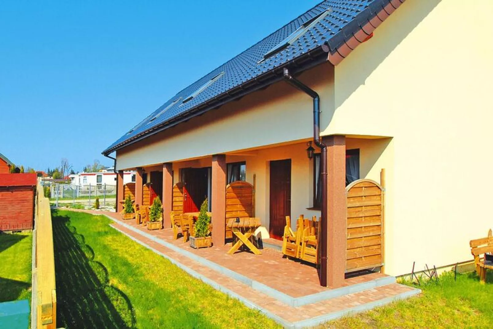 Domki szeregowe dla 4 osób Sarbinowo-Buitenkant zomer