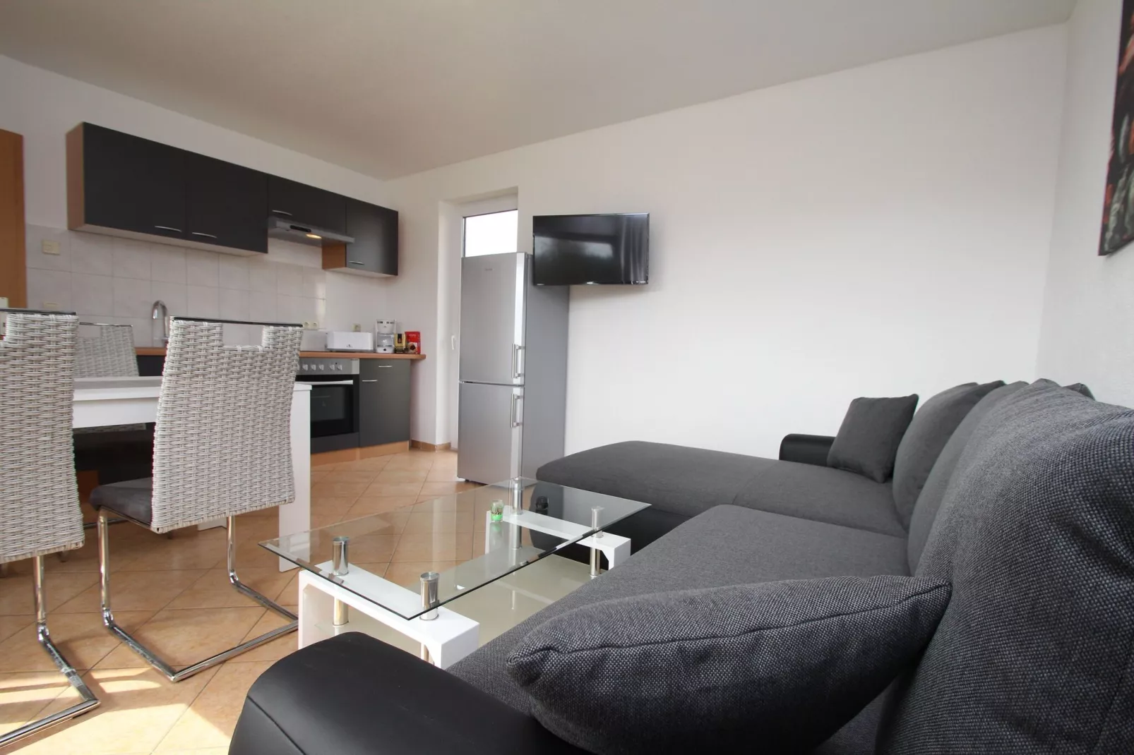 Reihenbungalow Nr 11 / Belegung 1-2 Personen-Woonkamer