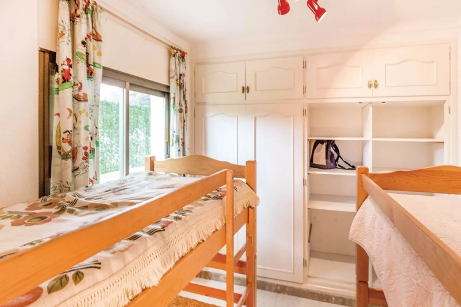 Casa con piscina y jardín L'Escala-Slaapkamer