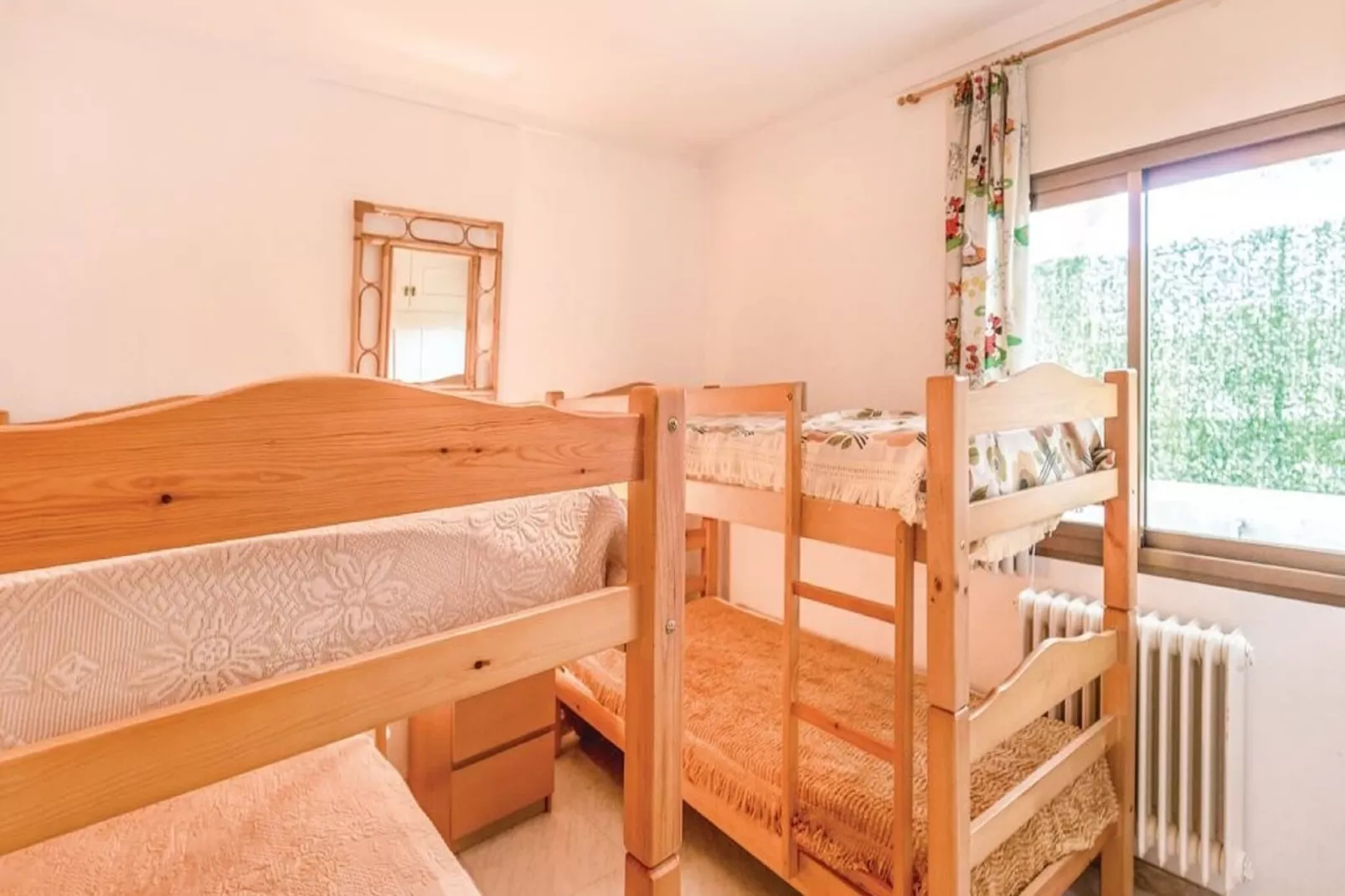 Casa con piscina y jardín L'Escala-Slaapkamer
