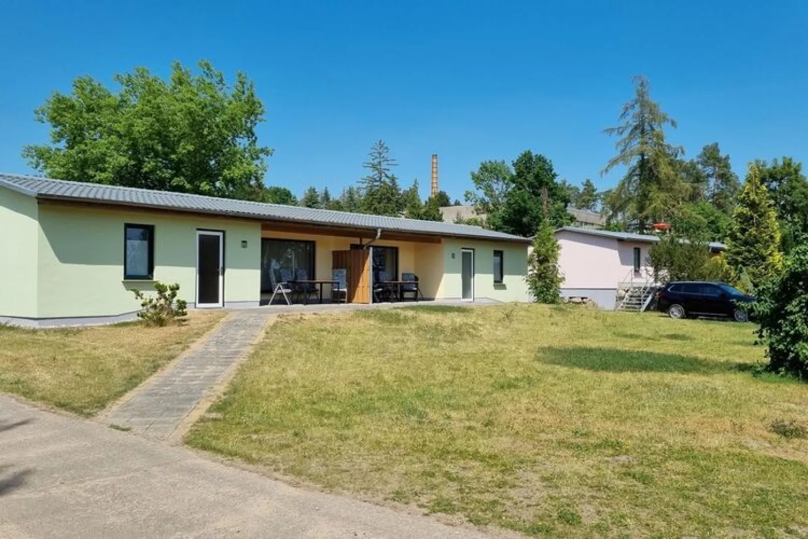 Reihenbungalow Nr 10 / Belegung 4 Personen-Buitenkant zomer