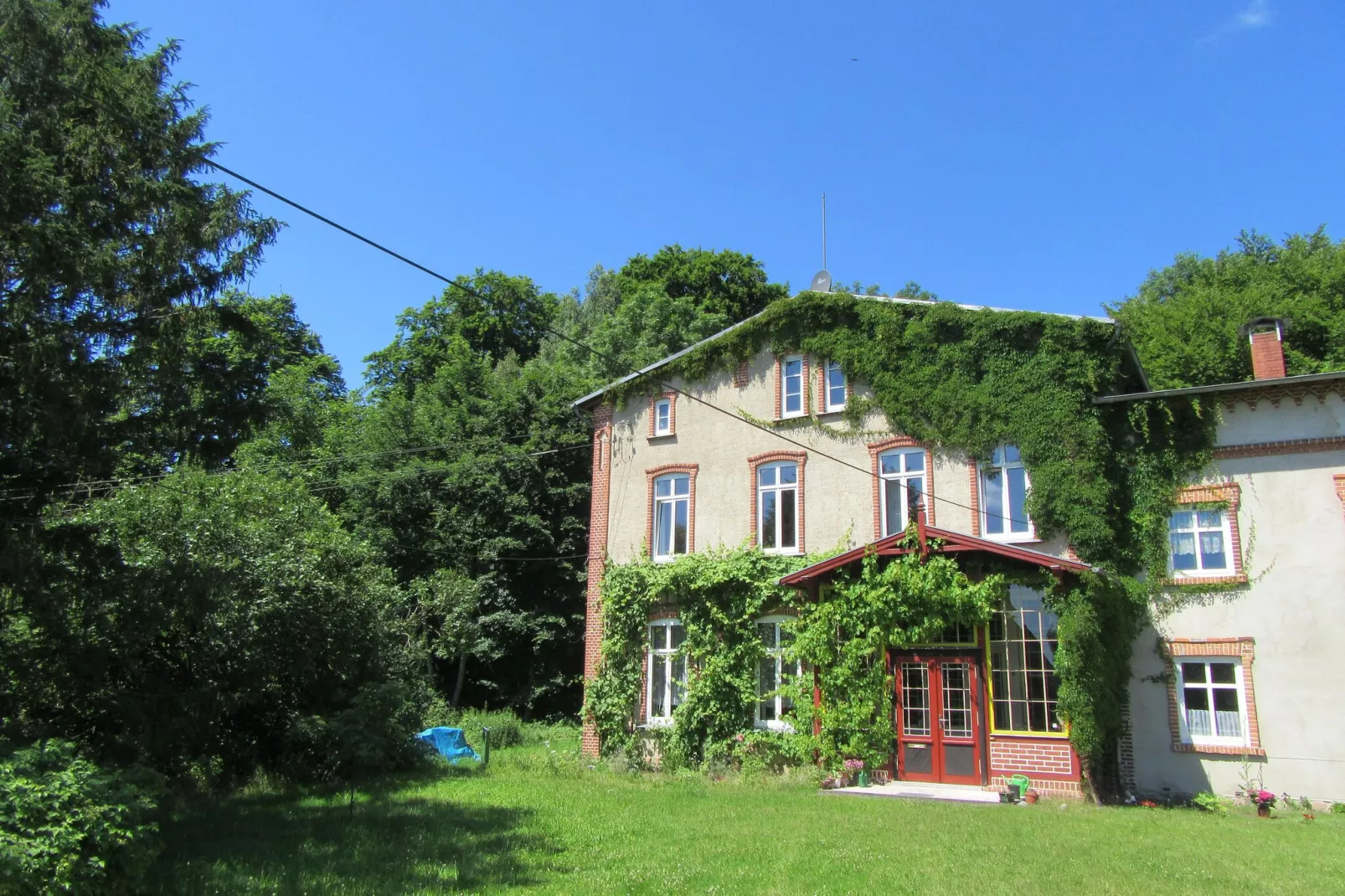 Wohnen im Gutshaus-Tuinen zomer
